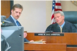 Attorney Robert E Calesaric and judge in courtroom